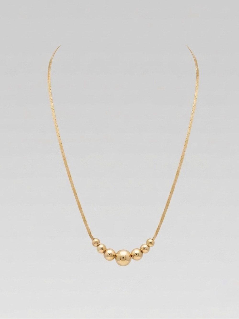Vintage 80s Gold Tone Graduated Bead Ball Station Necklace, 18” Length